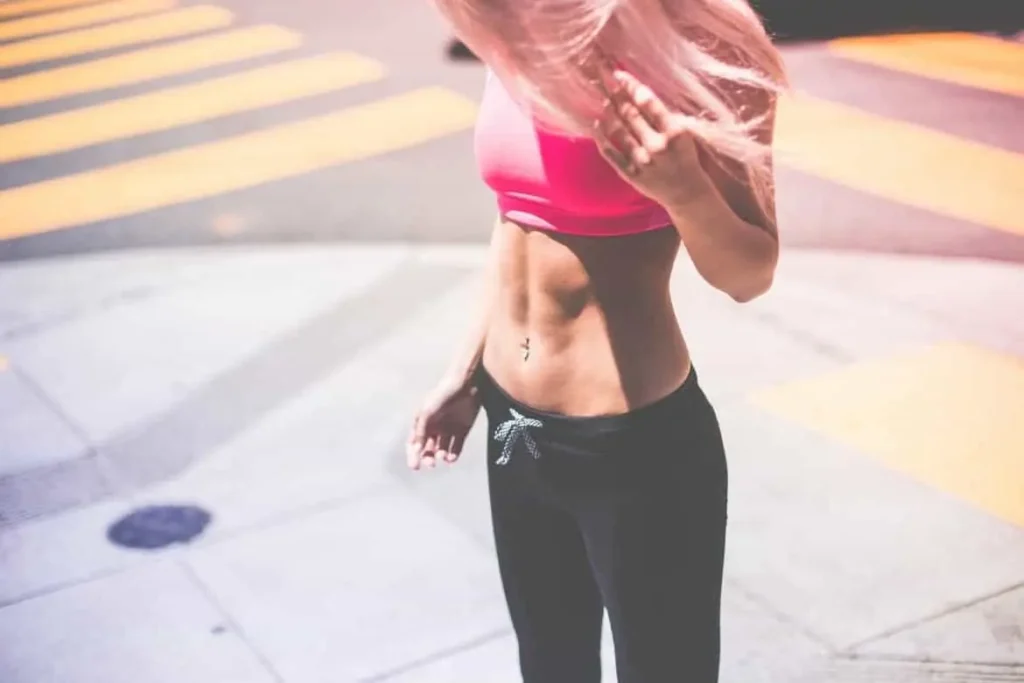 Woman with toned stomach after LA-EMS Body Sculpting Treatment Marlborough